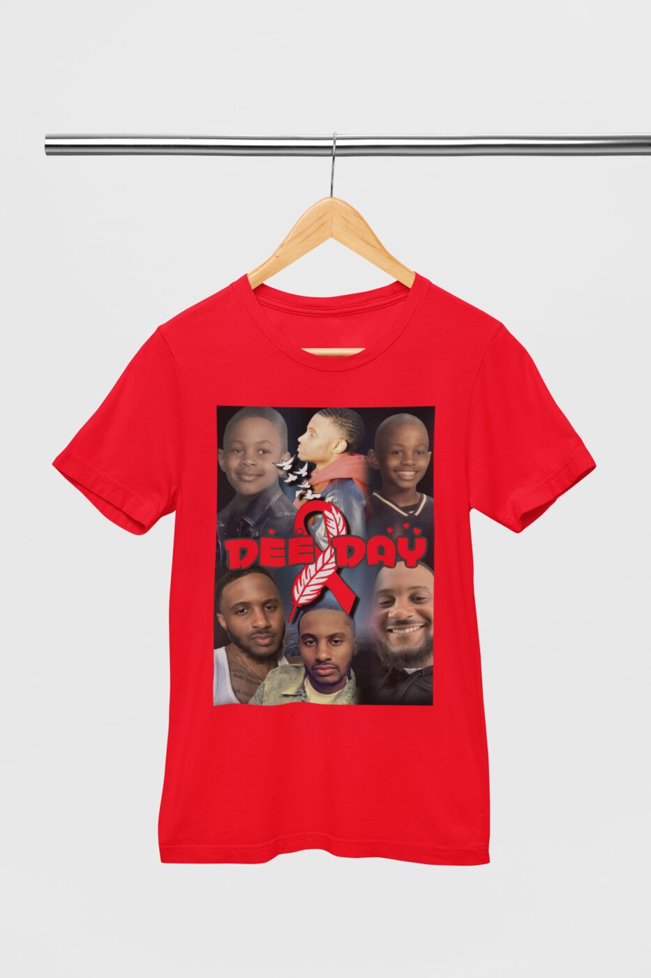 A red t-shirt on a hanger printed with a collage of family photographs and a red awareness ribbon.